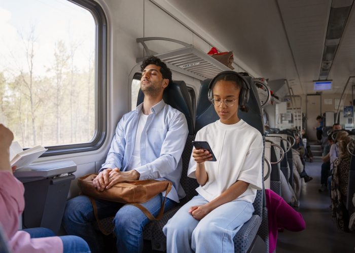 side-view-people-traveling-by-train (1)